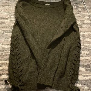 Garage long sleeve with detail on the sides.